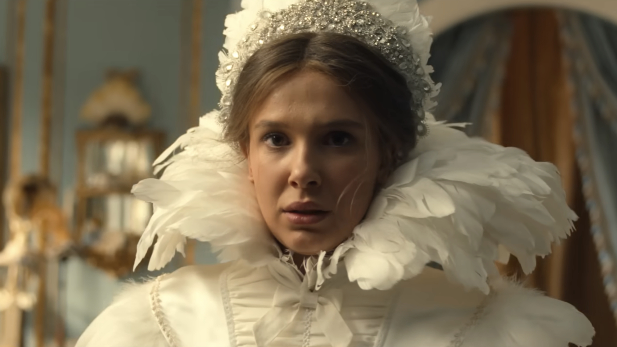 Enola (Millie Bobby Brown) tries on wedding dresses in Enola Holmes 3.