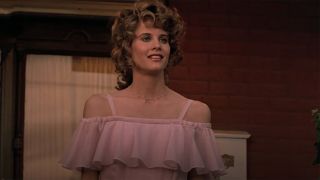 Lori Singer in Footloose 1984 prom dress, pink.