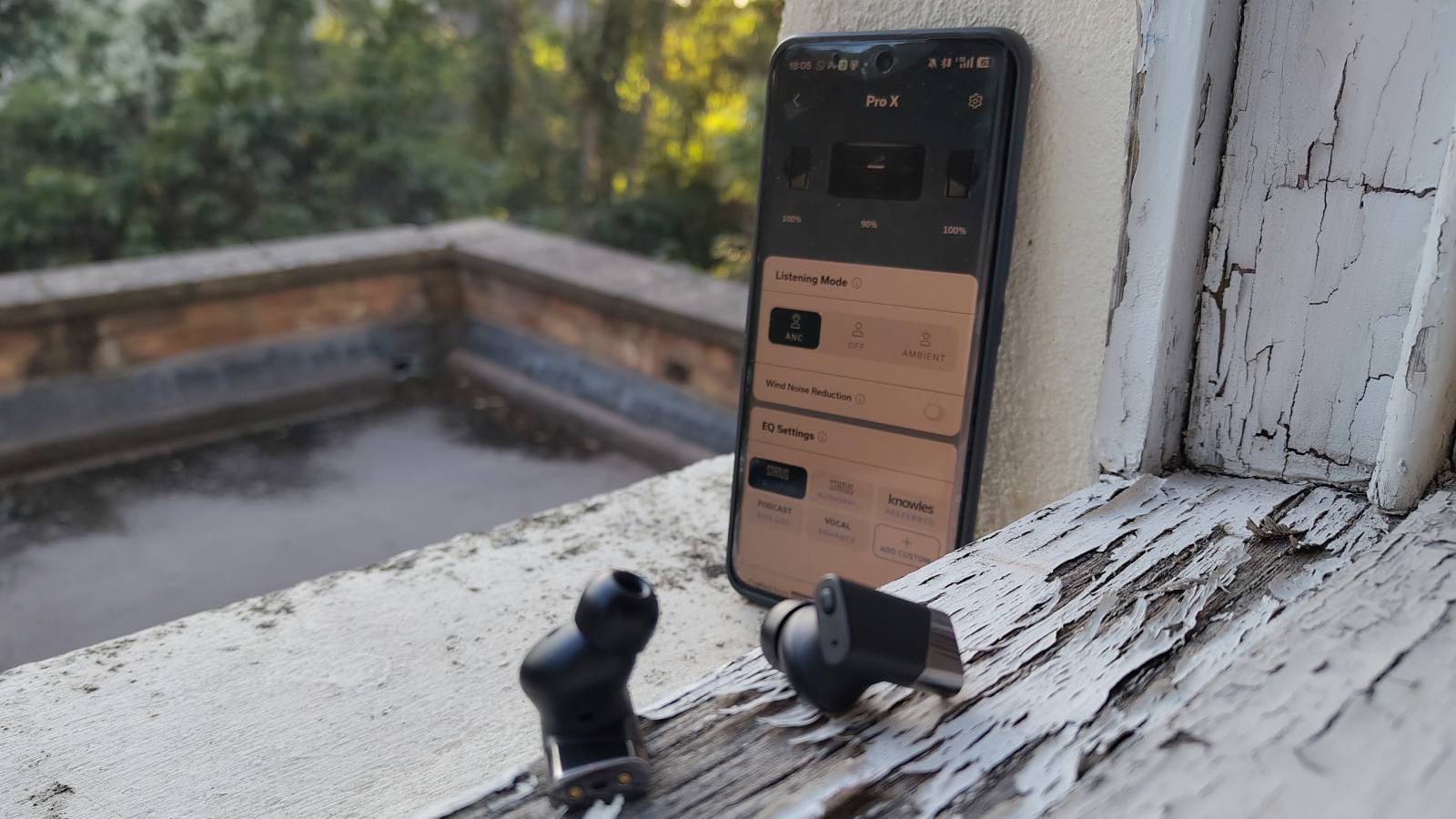 The Status Audio Pro X on a window sill.