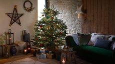 rustic Christmas tree in green living room
