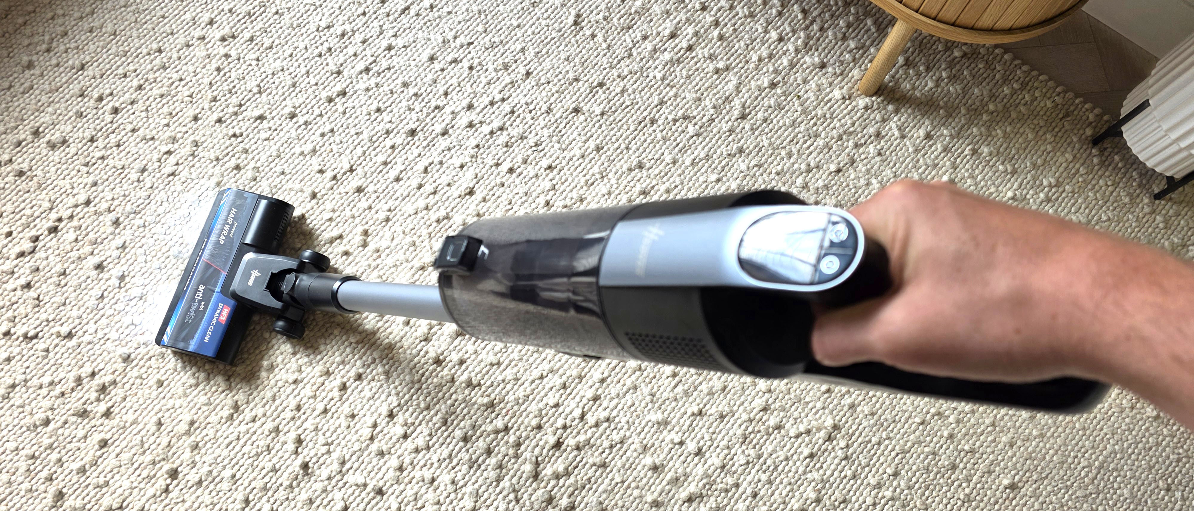 Hoover HF3 DynamicClean vacuum cleaner being used to clean carpet