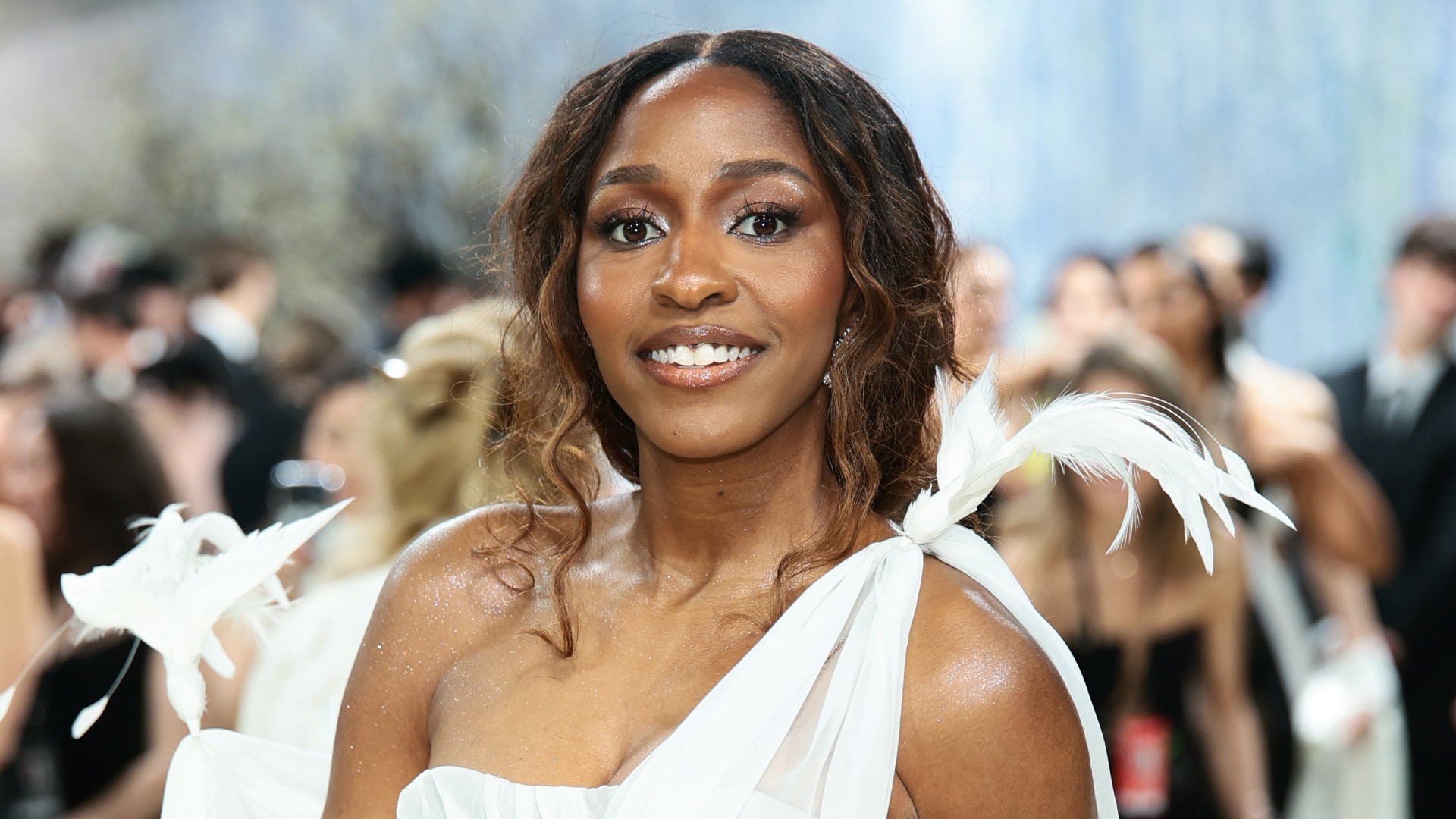 ayo edebiri attends the 2026 met gala wearing honey brown hair and a white gown
