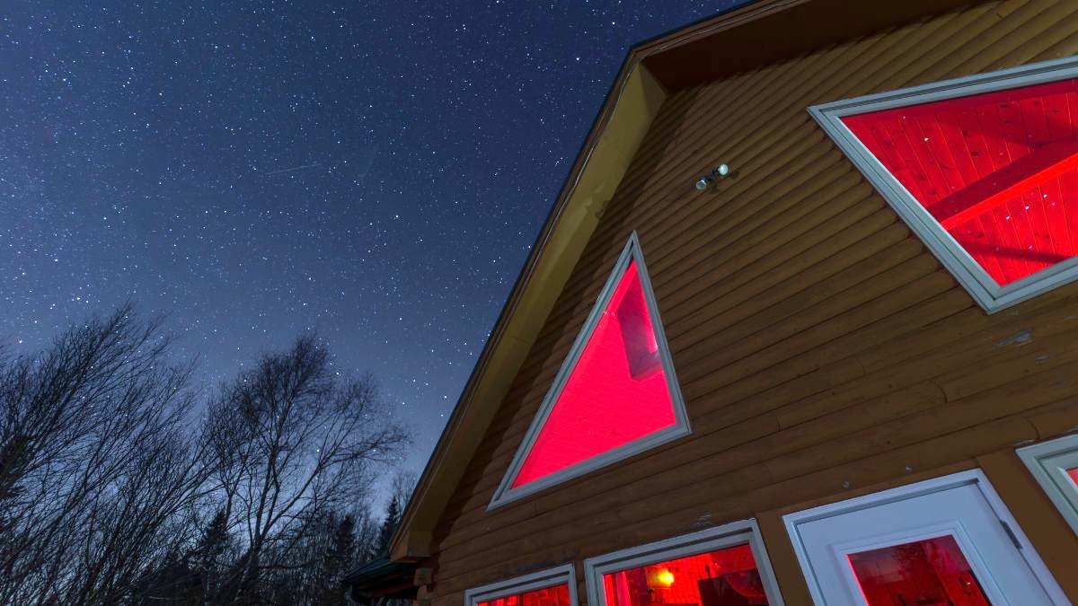 A view of a house against the night sky in Canada