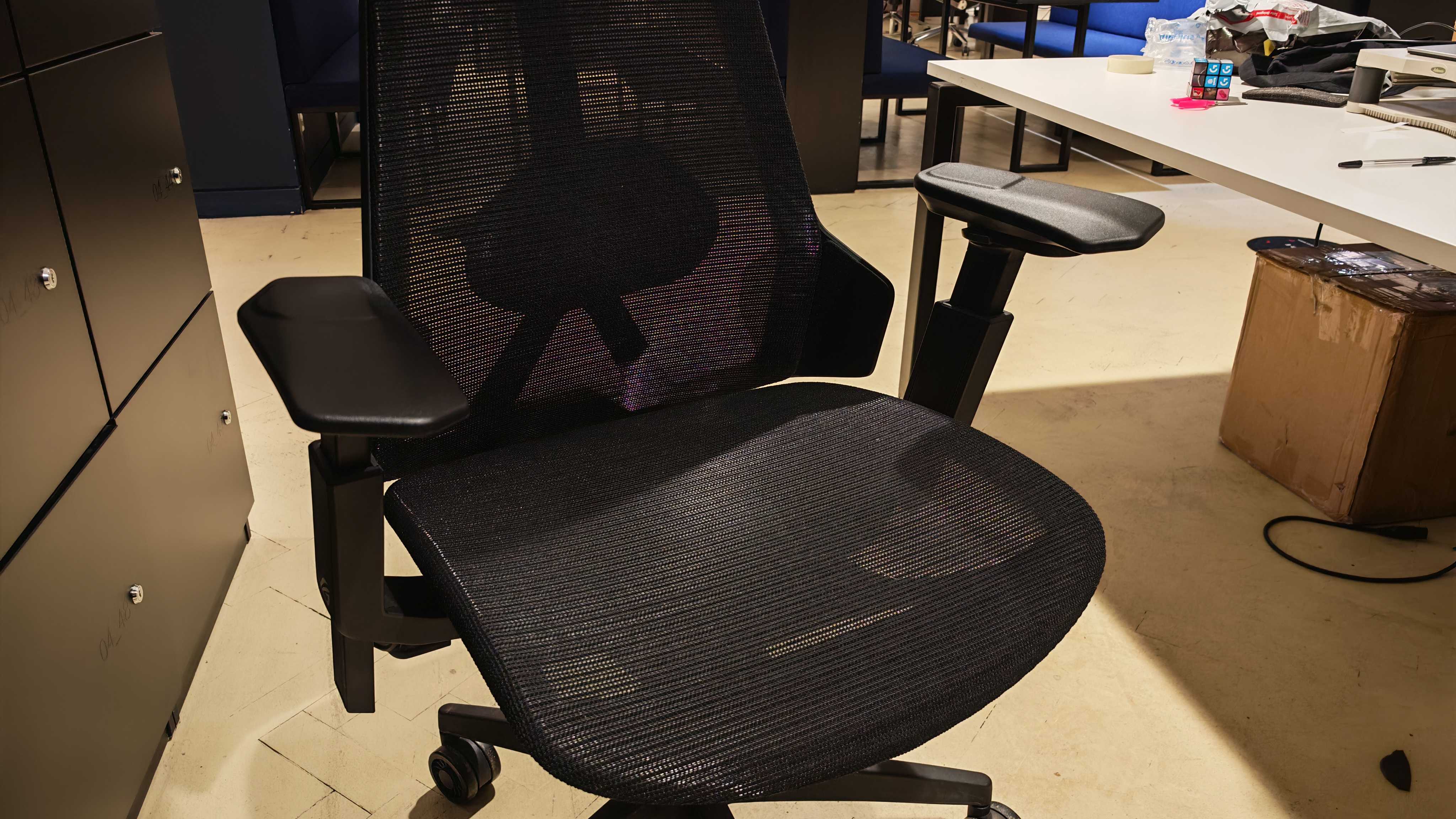 The Asus ROG Destrier Core Gaming Chair in an office environment.