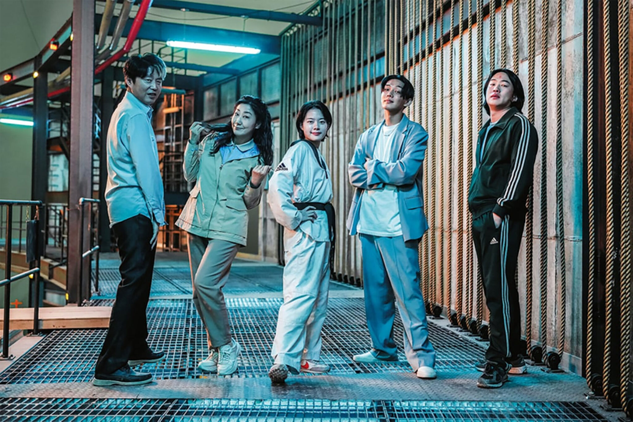 Five people (l-r Kim Hee-won, Ra Mi-ran, Lee Jae-in, Yoo Ah-in and Ahn Jae-hong) pose while standing in a factory, in the Korean movie 'Hi-Five.'