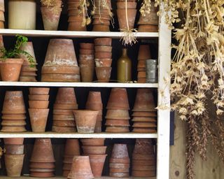 clay garden pots in shed