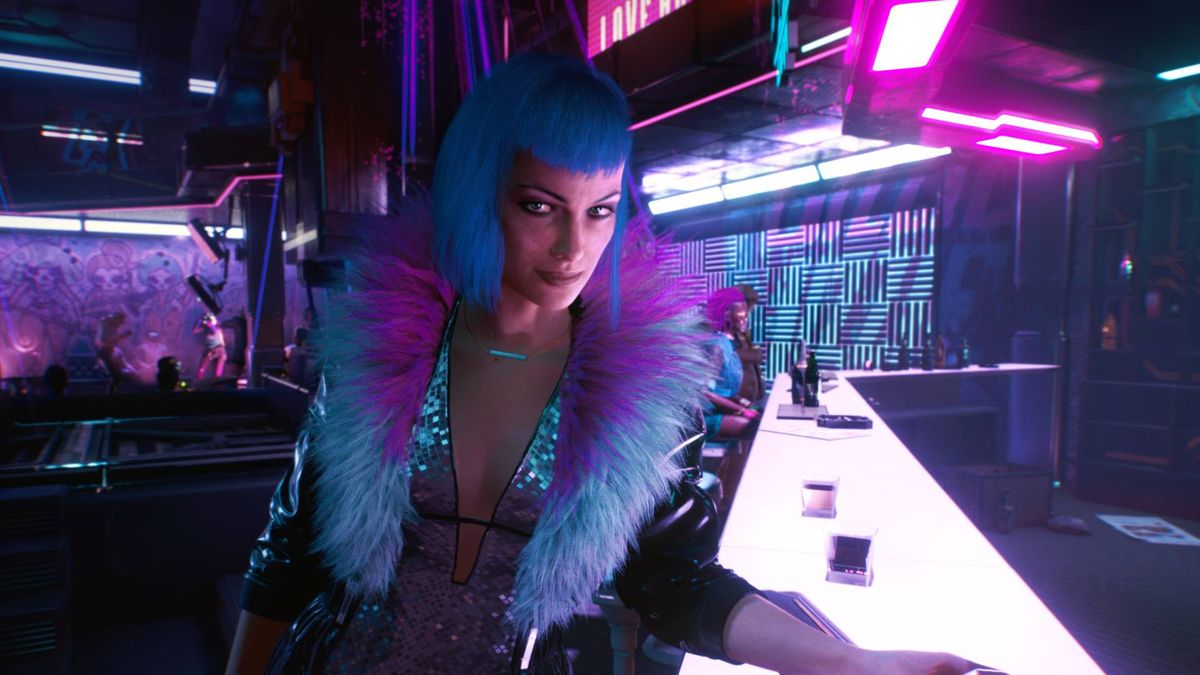 A woman with blue hair stood at a neon-lit bar in Cyberpunk 2077 with a drink in her hand.