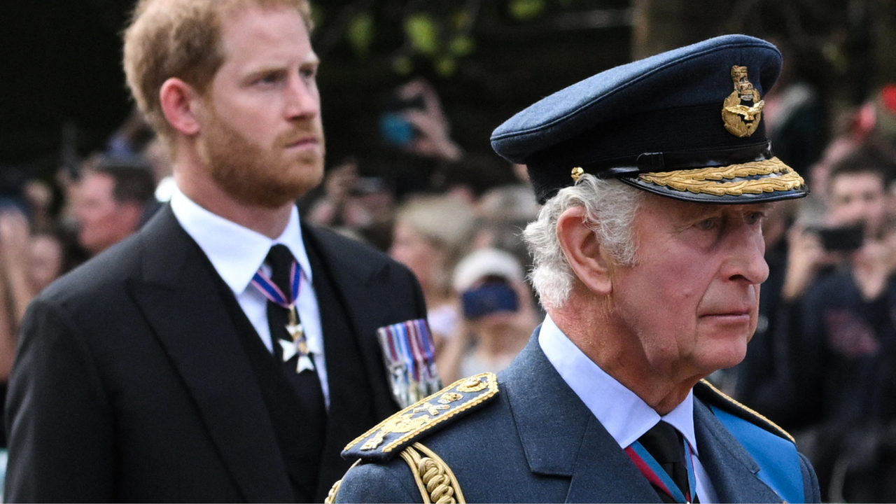 Britain&#039;s King Charles III and Britain&#039;s Prince Harry, Duke of Sussex walk behind the coffin of Queen Elizabeth II