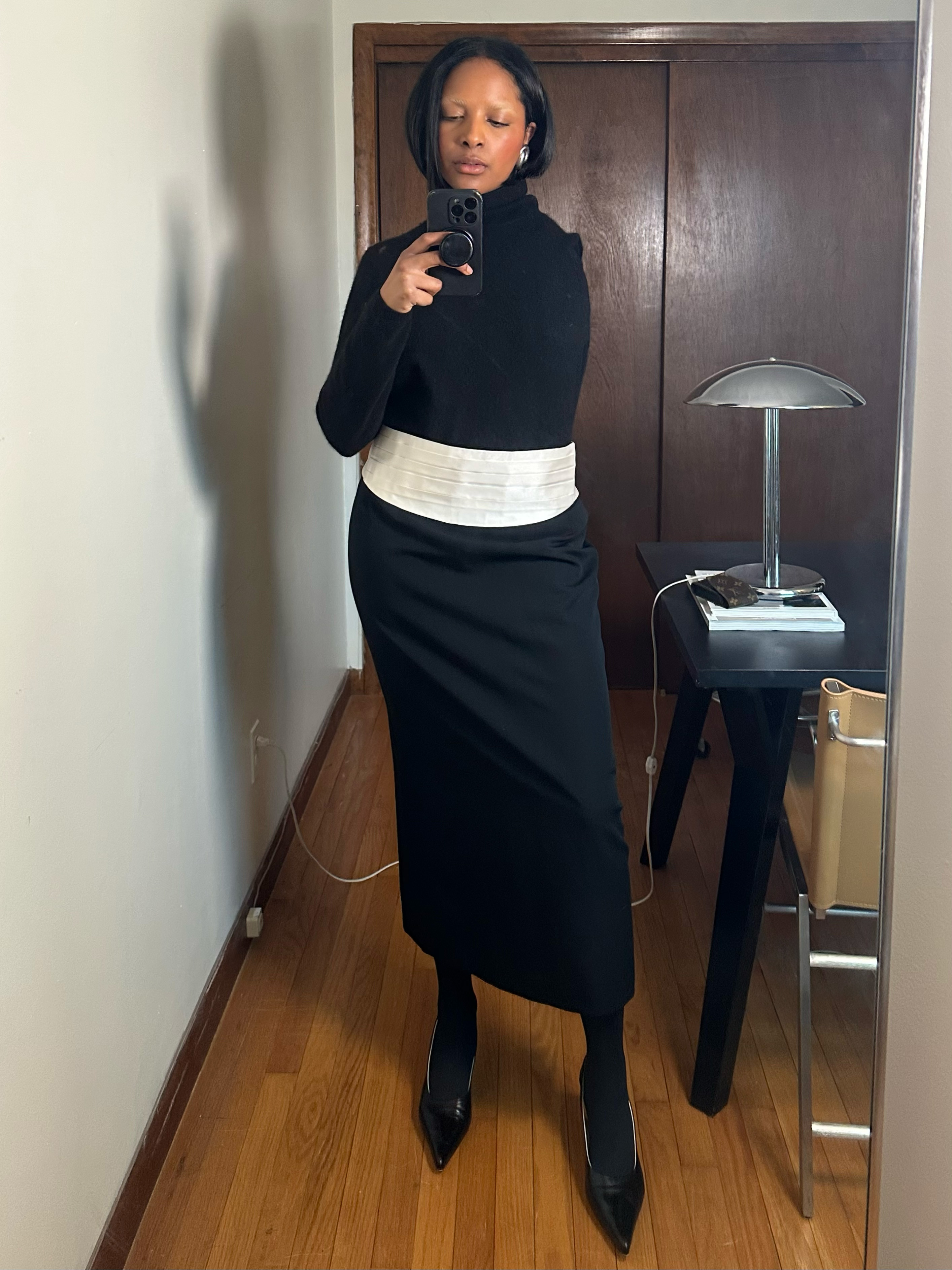 Maya Moore wearing black and white outfits