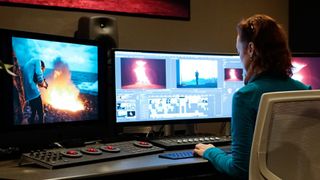 Video editing software: Woman using Premiere Pro