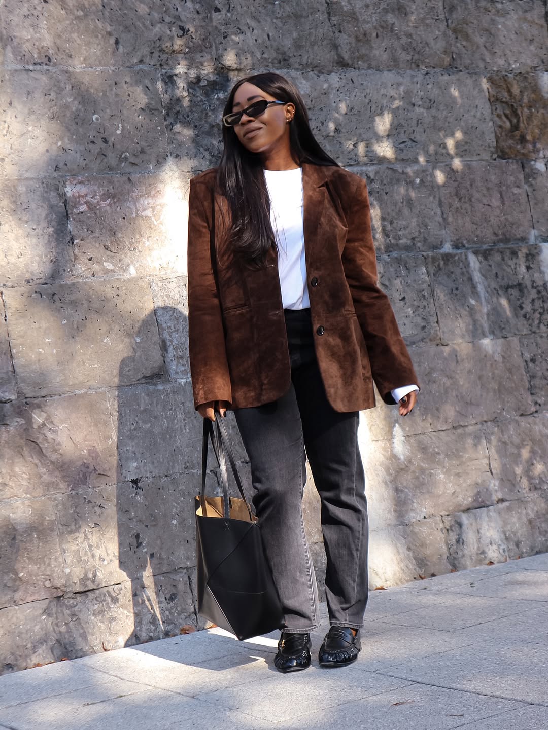 Stylish women wearing grey jeans