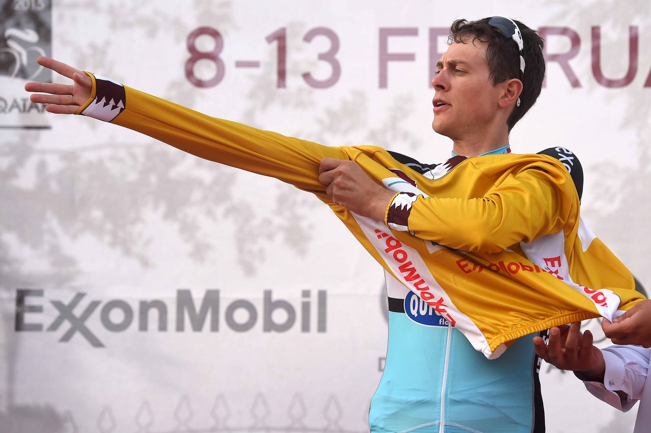 Niki Terpstra (Etixx-QuickStep) pulls on the gold leader's jersey for a second day