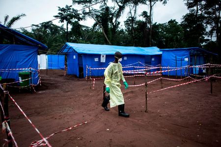 A health care worker helping Ebola patients in 2017.