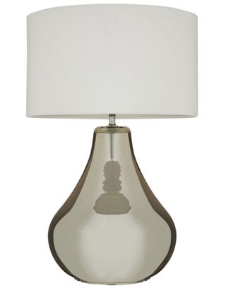 table lamp in white colour with soft curves and wide fabric shade
