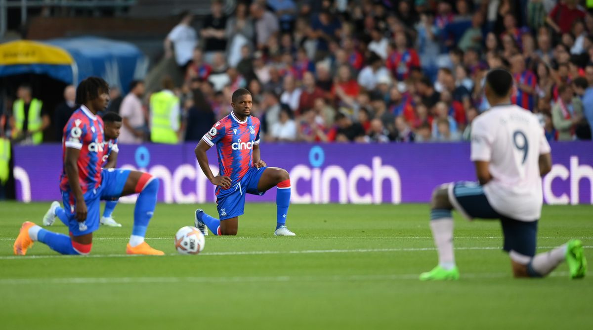 Cheick Doucoure of Crystal Palace takes a knee prior to kick off of the Premier League match between Crystal Palace and Arsenal FC at Selhurst Park on August 05, 2022 in London, England