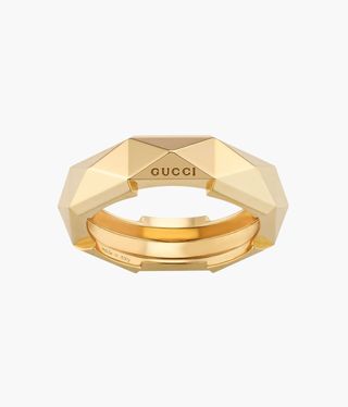 Faceted gold Gucci eternity band