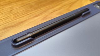 XPPen Magic Drawing Pad; a stylus clipped into a drawing table stand