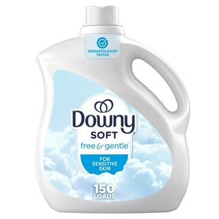 A laurge bottle of downy soft laundry softener on a white background