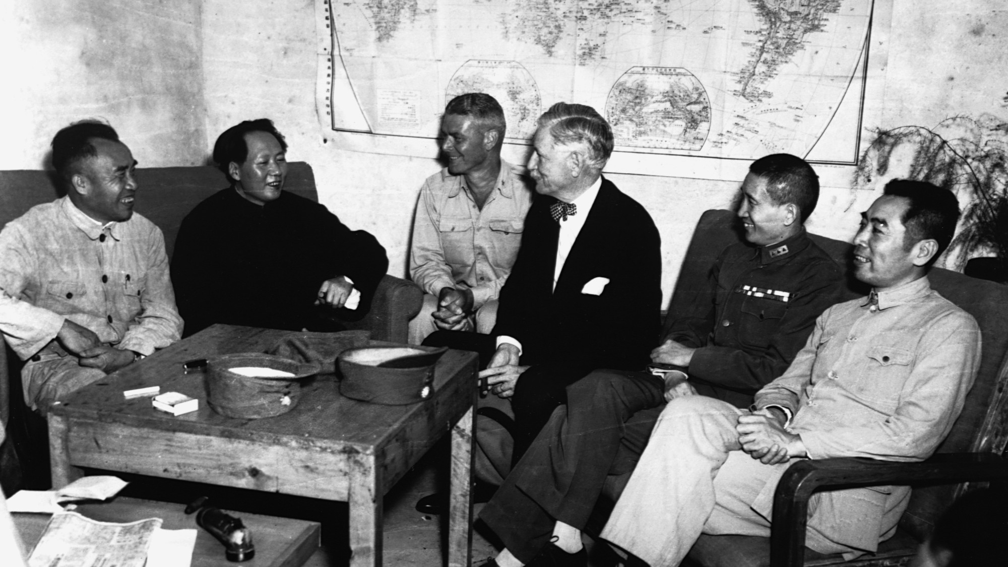 Chairman Mao Tse-Tung (second from left) pictured with U.S. Army Observer Col. I. V. Yeaton U.S. Ambassador Patrick J. Hurley