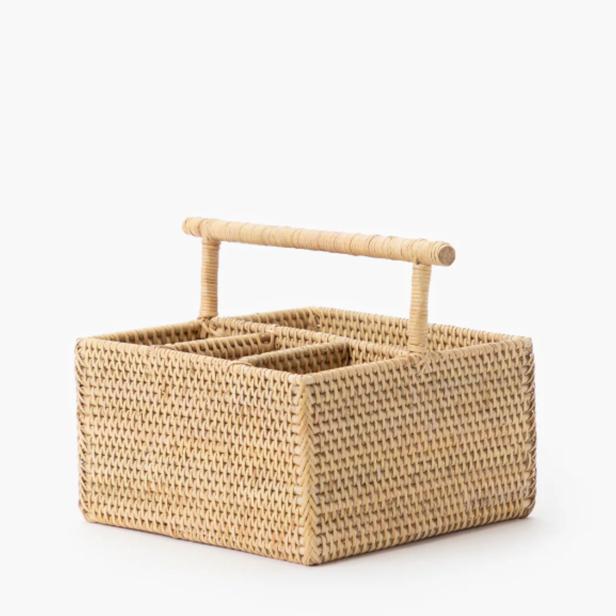 rattan utensil caddy on white background