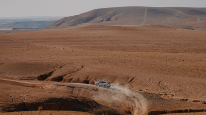 Dacia Duster driving through the Agafay desert