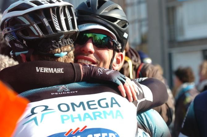 Mark Cavendish celebrates with an Omega Pharma - Quick-Step teammate following his victory