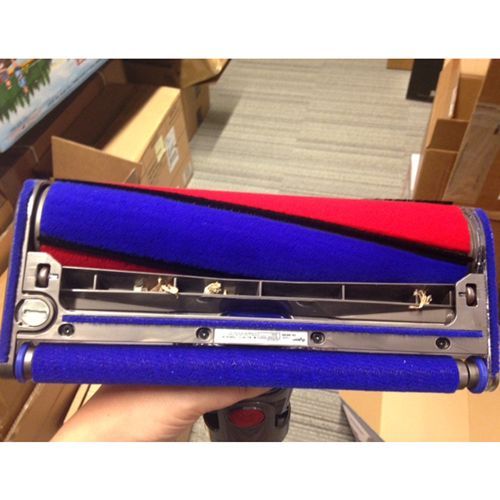 The carpet-like rollers in the V6 head catch pet hair and other materials.