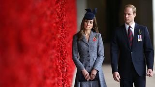 canberra, australia april 25 catherine, duchess of cambridge and prince william, duke of cambridge walk along the world war i wall of remembrance during their visit to the australian war memorial on anzac day on april 25 2014 in canberra, australia the duke and duchess of cambridge are on a three week tour of australia and new zealand, the first official trip overseas with their son, prince george of cambridge photo by gary ramage poolgetty images