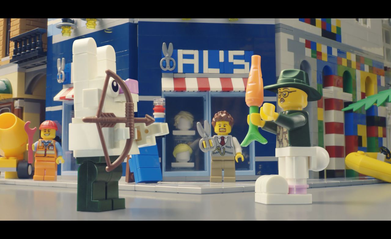 A still from the Lego Group’s ‘Rebuild the World’ film. Different Lego toys are set in front of the store that&#039;s called Al&#039;s.