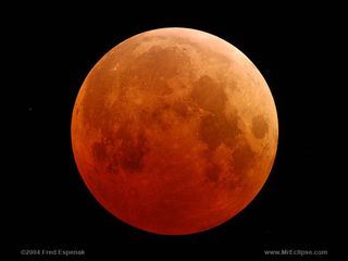 The moon turns blood red in this image of a total lunar eclipse from 2004. 