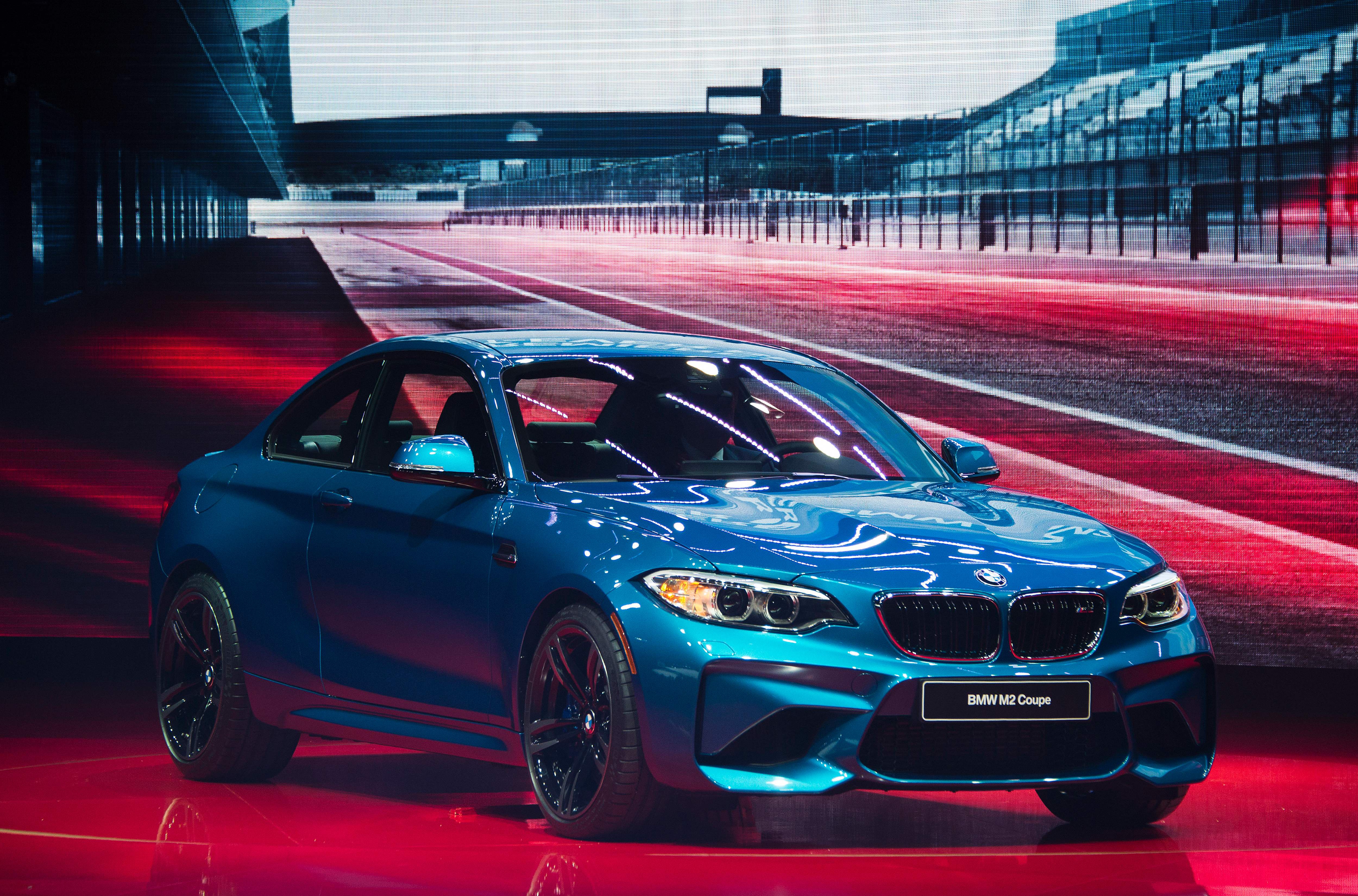World premiere of the 2016 BMW M2 Coupe during the BMW press conference at the North American International Auto Show in Detroit, Michigan, January 11, 2016. AFP PHOTO / JIM WATSON / AFP / JI