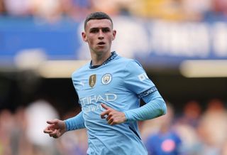 LONDON, ENGLAND - AUGUST 18:Phil Foden of Manchester City during the Premier League match between Chelsea FC and Manchester City FC at Stamford Bridge on August 18, 2024 in London, England. (Photo by Catherine Ivill - AMA/Getty Images)