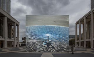 It is a model of a new solar power station made up of 10,000 sun-tracking mirrors called heliostats