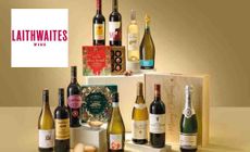 Laith Waites logo placed over a collection of red and white wines