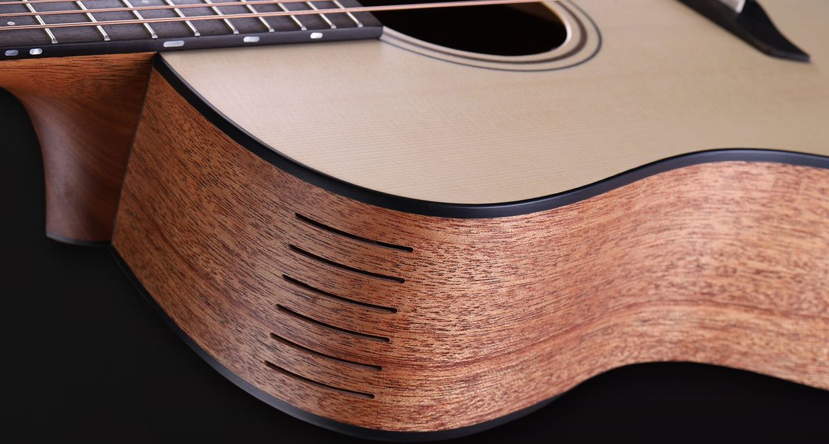 Furch Guitars Booster Soundport: a new design that enhances volume and tone, featuring six precision cuts on the top of the body to complement the soundhole