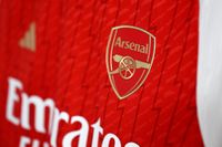 An Arsenal badge on a shirt inside the Arsenal dressing room prior to the Premier League match between Manchester City and Arsenal FC at Etihad Stadium on March 31, 2024 in Manchester, England.