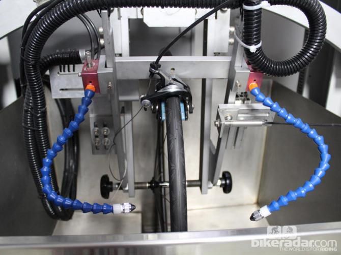 Water can be sprayed on the wheel, and brake force, temperature and time to stop are measured. Reynolds brake test involves 16 minutes of continuous braking, ramping up to 1,200 watts