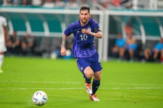 Forward Lionel Messi #10 of Argentina runs with the ball during the international friendly match between Honduras and Argentina at Hard Rock Stadium on September 23, 2022 in Miami Gardens, Florida.