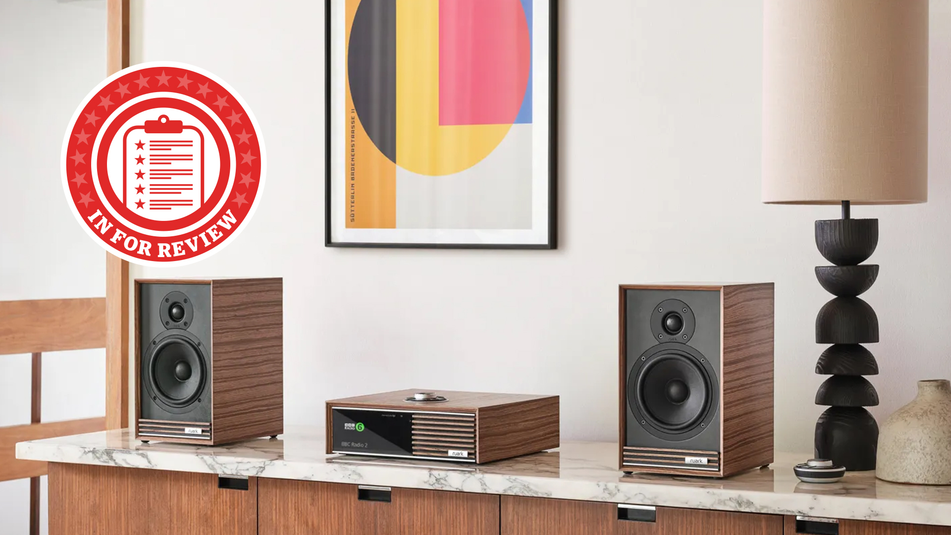 Ruark Audio Sabre-R speakers next to the Ruark R610 streaming system