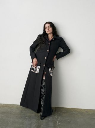Model wears coat by Chanel