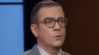 Ted Allen reacting to a dish on Chopped. 