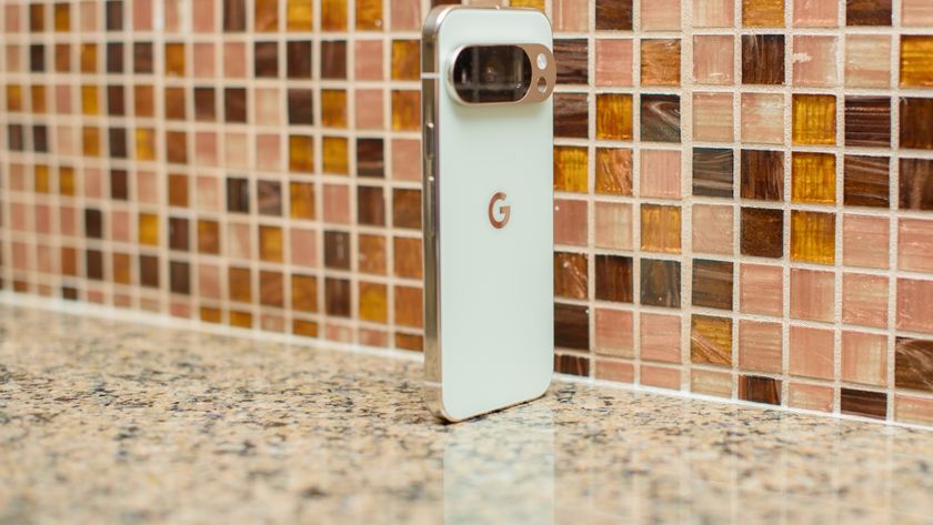 Google Pixel 10 Pro in Jade with checkered tile backsplash background