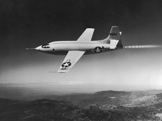 A photograph shows the rocket-powered Bell X-1 supersonic plane during a test flight.