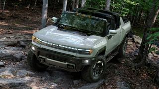 GMC Hummer EV Edition1 convertible in woods