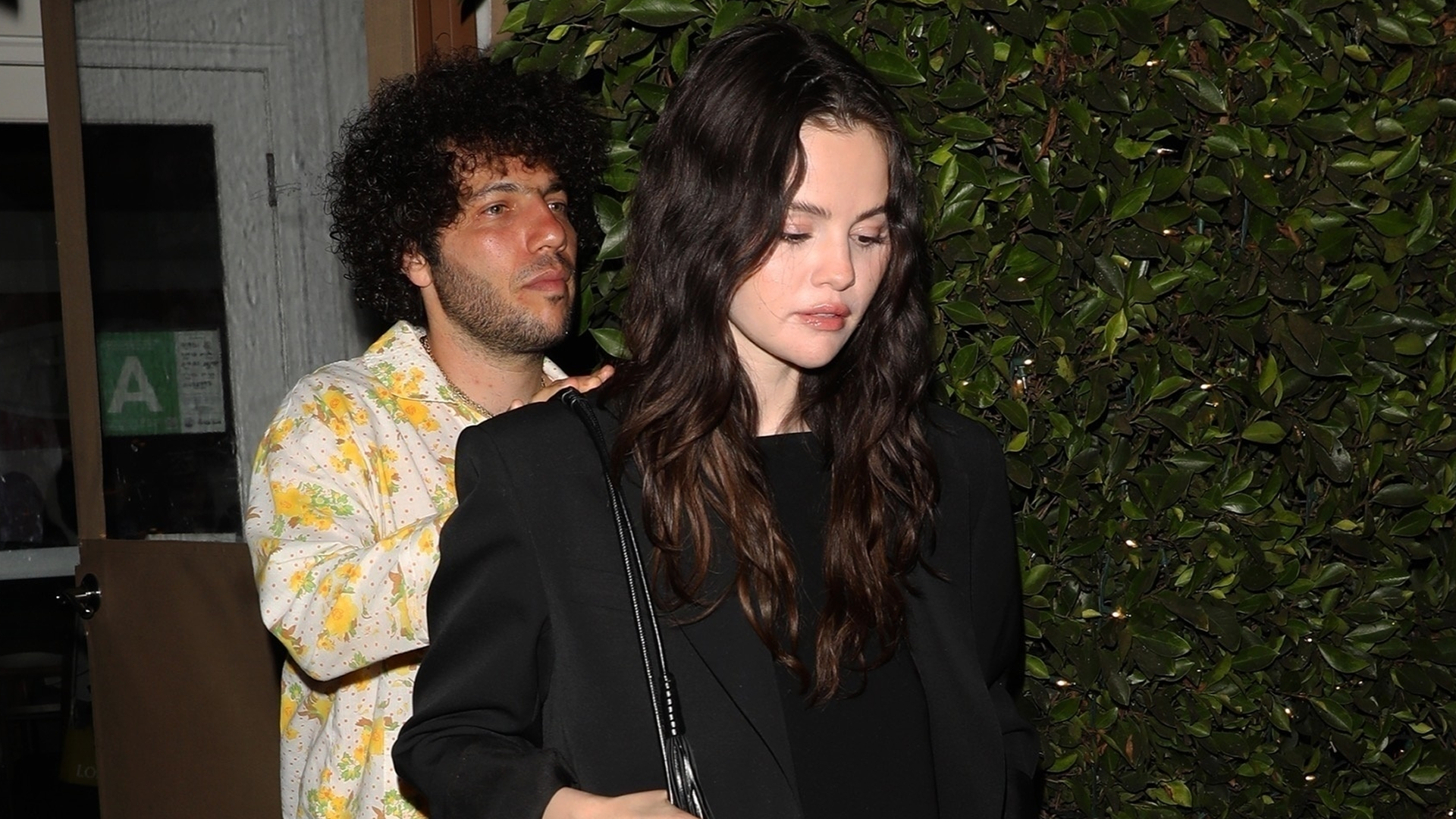 Selena Gomez wore an all-black matching set with leather T-strap Proenza Schouler sandals.