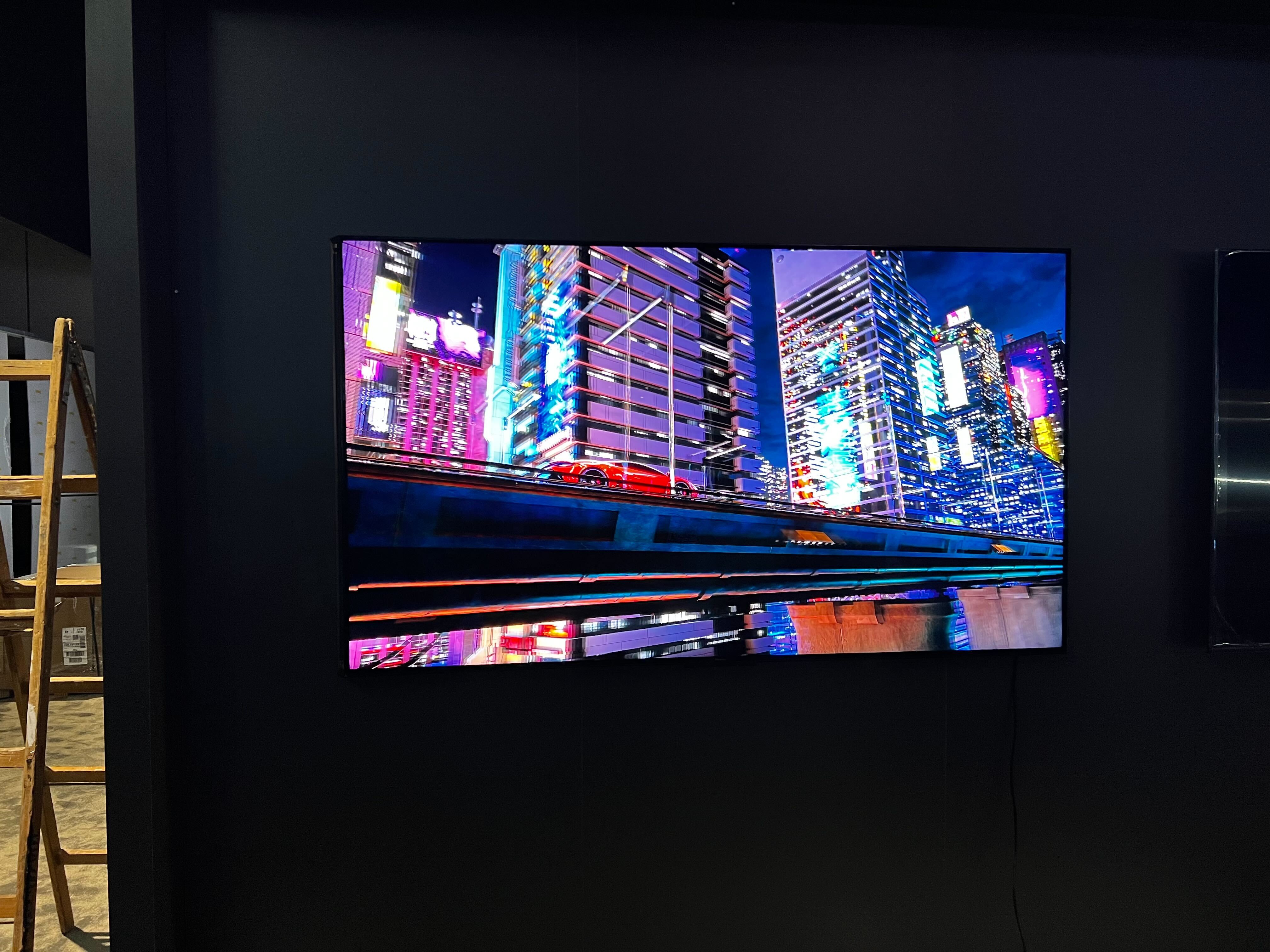 A TV on a wall with an anti-reflective coating