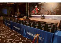 Beside the trophy cup is the raffle box representing the participating teams.