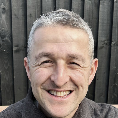 headshot of architect Daniel Woolfson from The DHaus Company