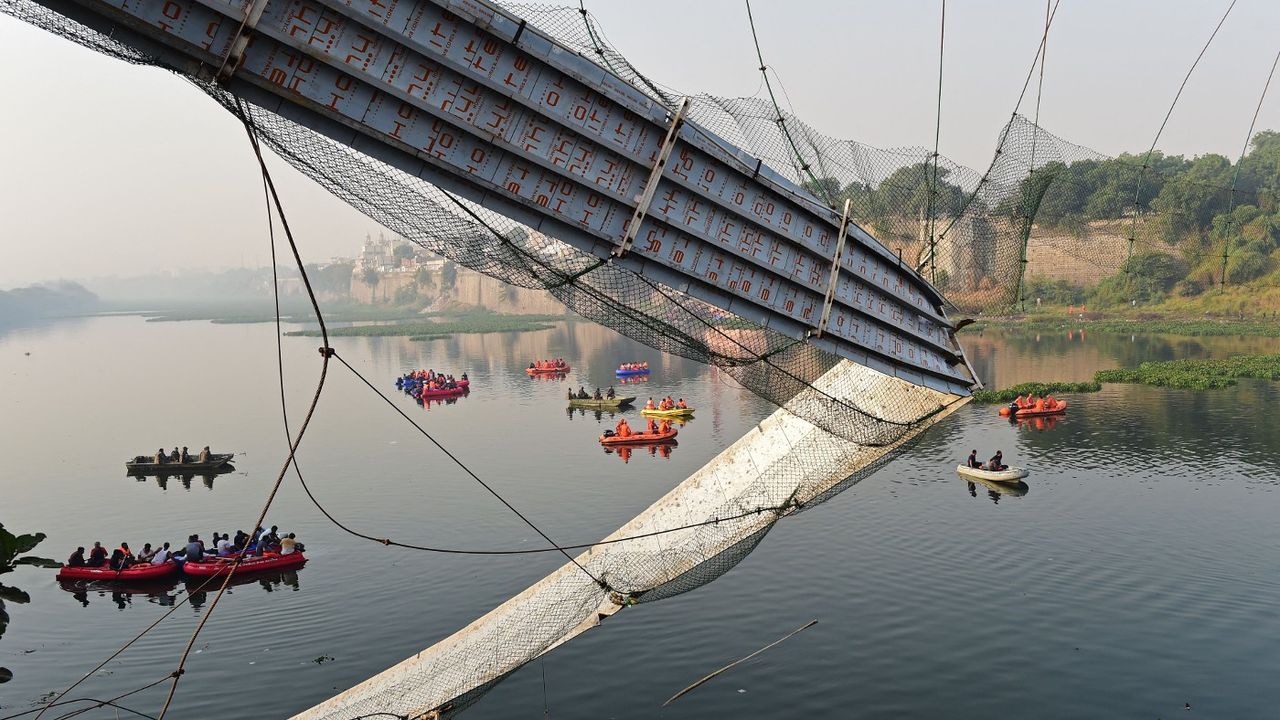 Search operations after a bridge across the Machchhu River collapsed