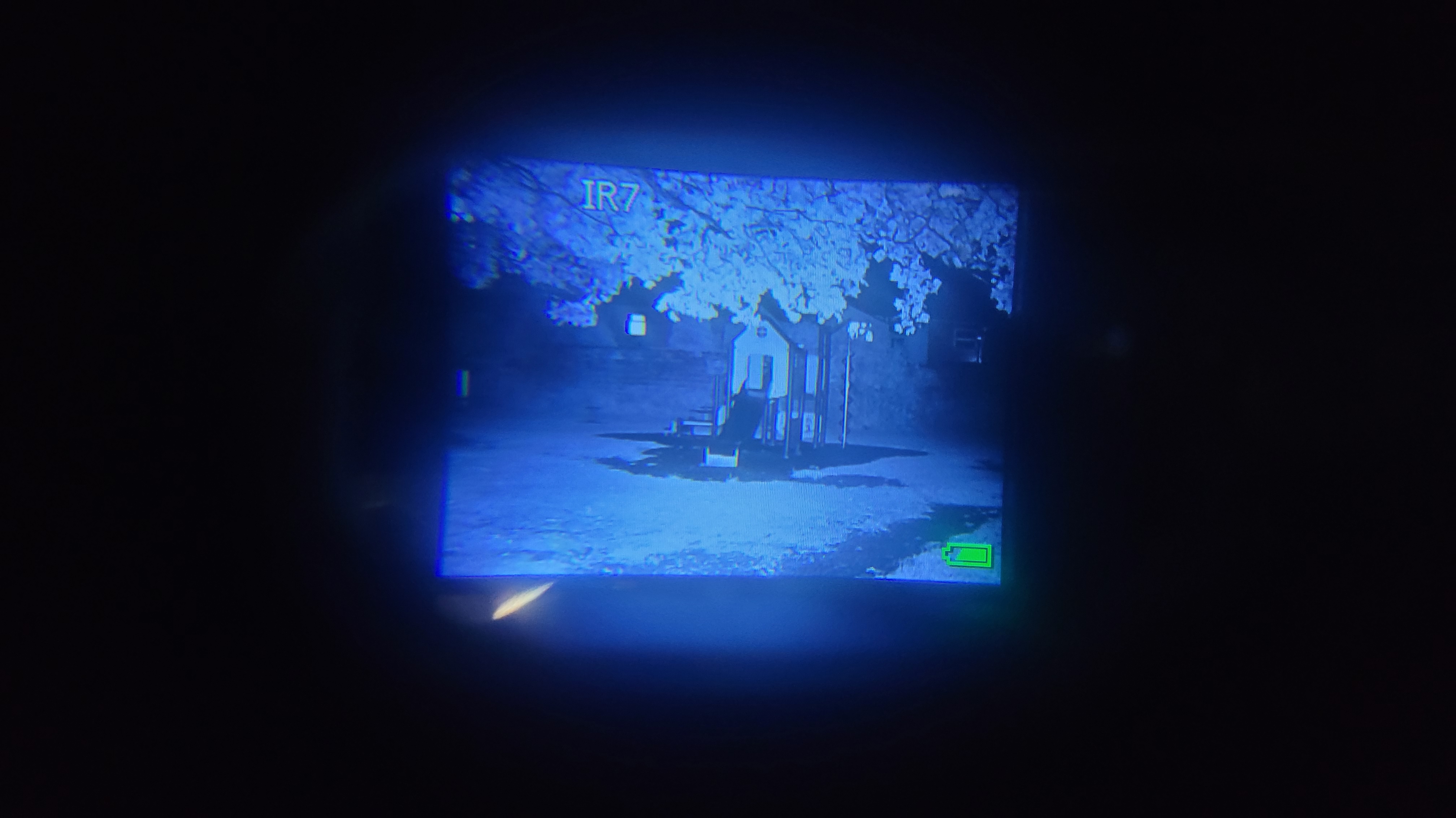 A view through the lens of the Nightfox Swift, showing a children's playground